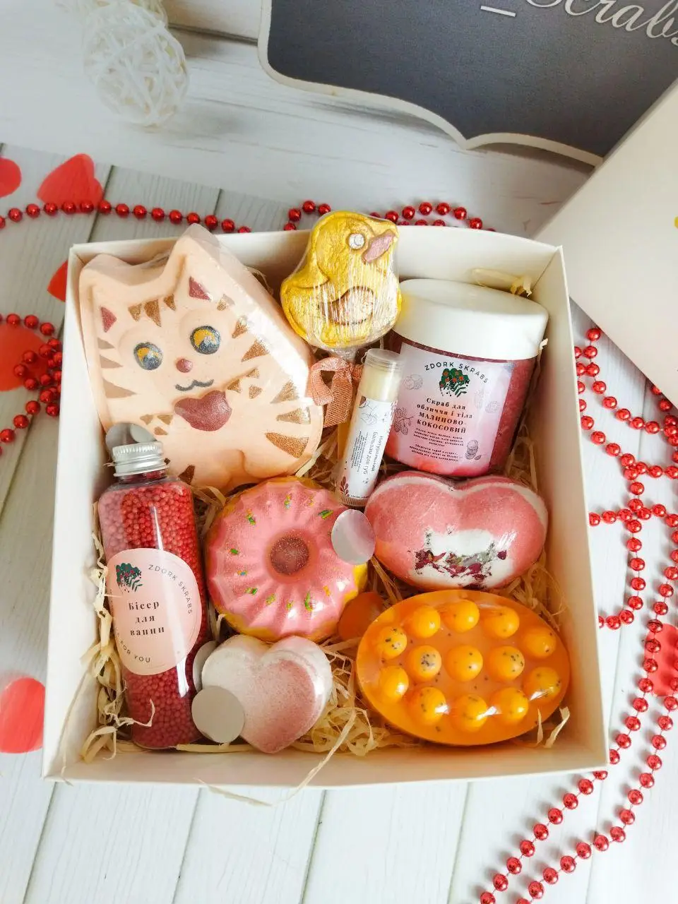 Pink spa gift box with candle, bath bomb, soap and sleep mask