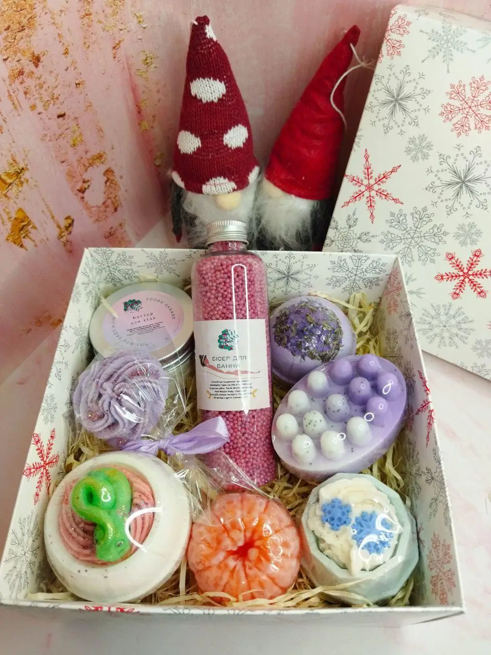 Natural body care box with body oil, soap, massage brush and bath bomb